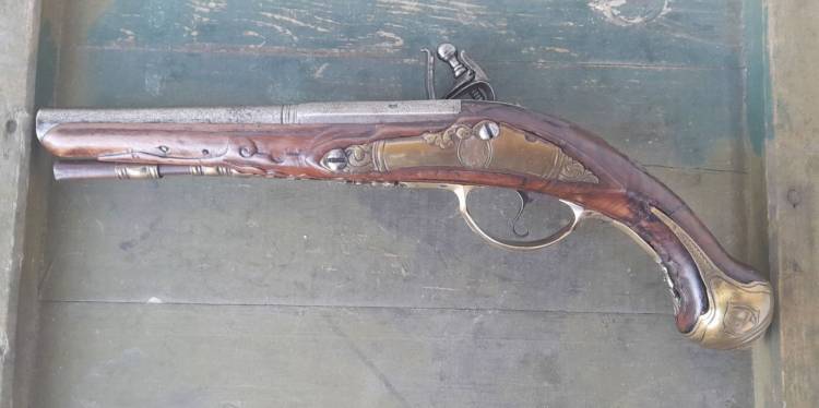 PISTOLA A PIETRA BRESCIANA, FIRMATA ‘NASE’. Cm. 29. SEC. XVIII.