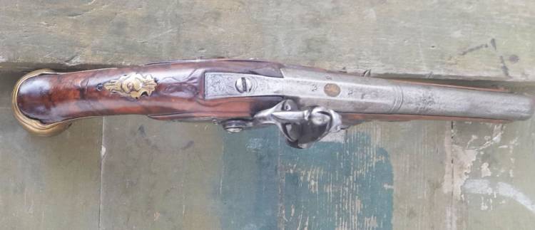 PISTOLA A PIETRA BRESCIANA, FIRMATA ‘NASE’. Cm. 29. SEC. XVIII.